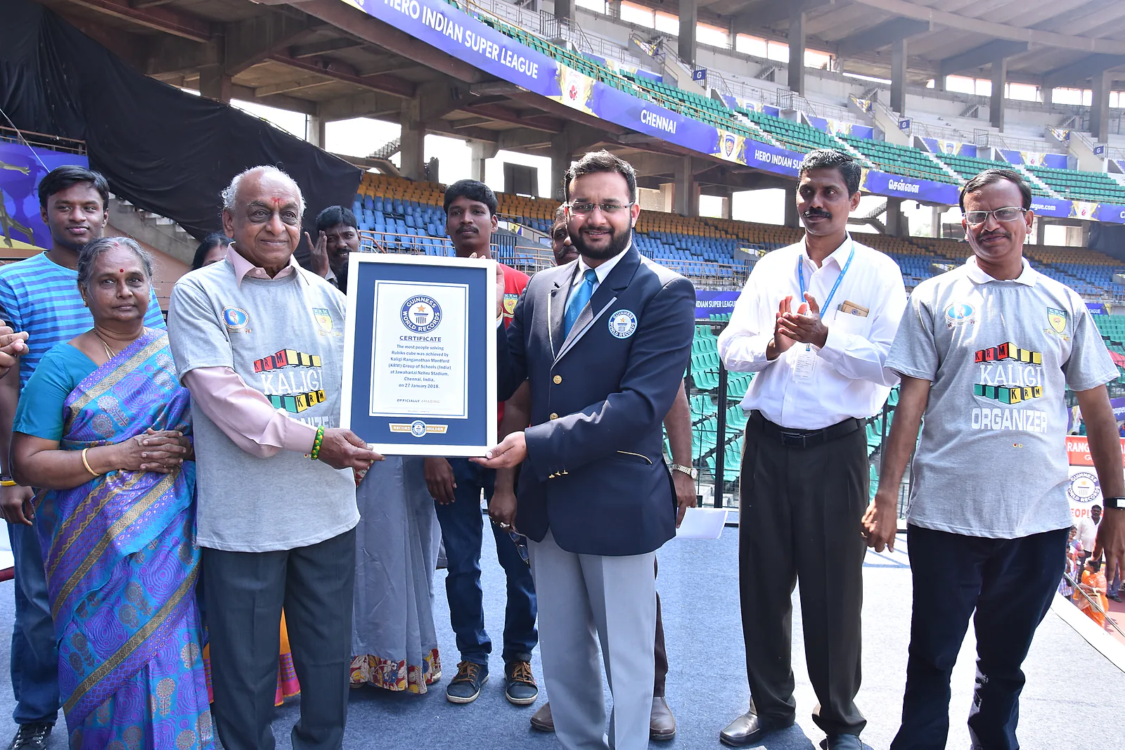 R.J. Bhuvanesh with officials holding the Guinness World Records certificate