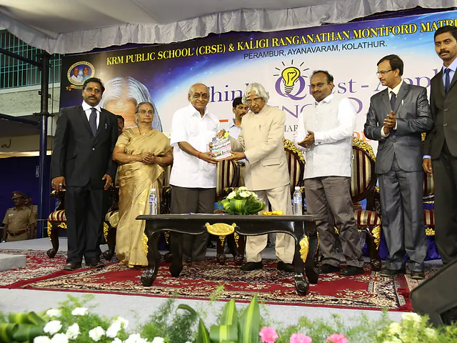 The Think, Quest, Apply book release on the KRM stage. A photograph of R.J. Bhuvanesh from the KRM Group of Schools archive