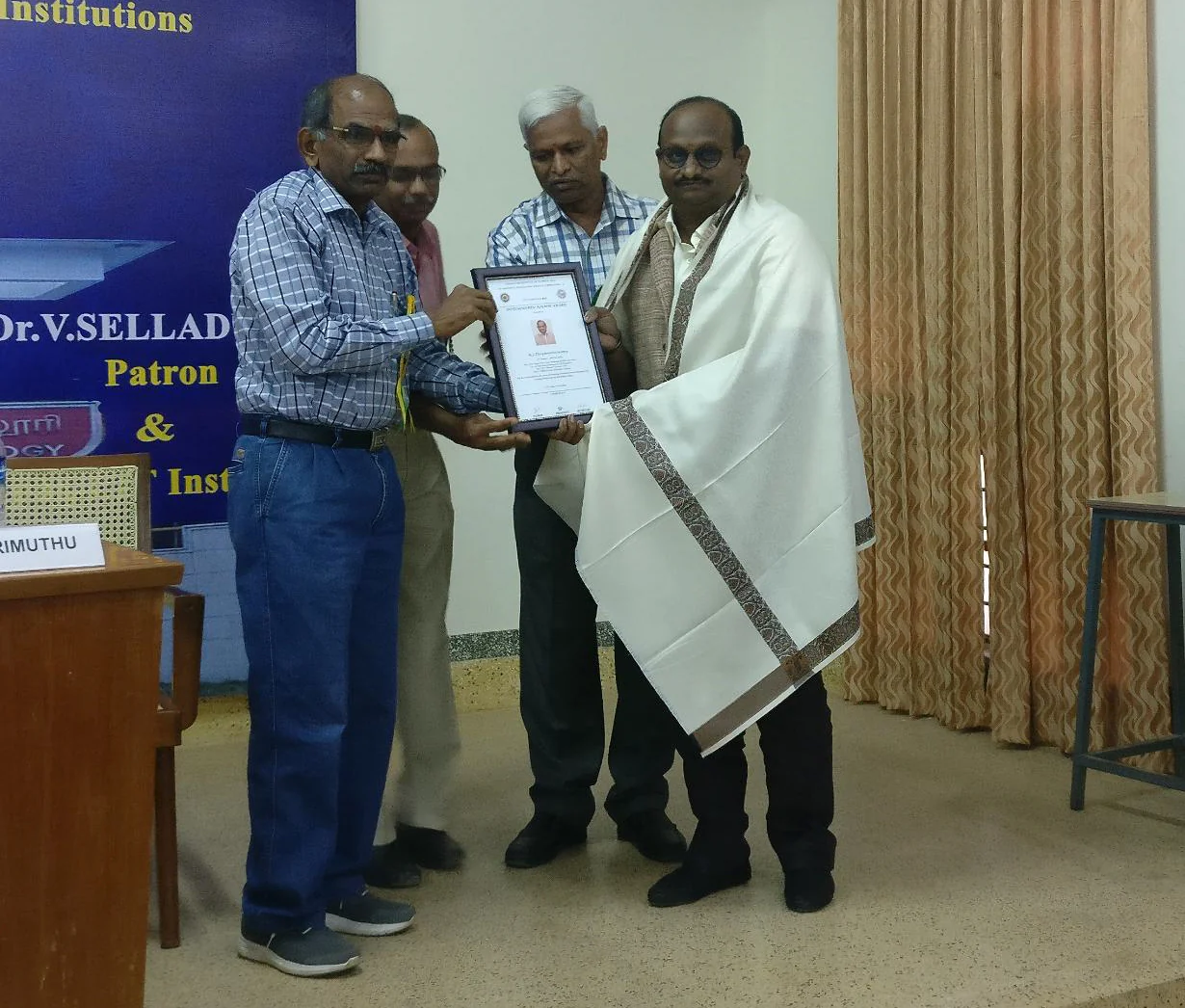 R.J. Bhuvanesh honoured with a shawl and citation at the Coimbatore Institute of Technology alumni day