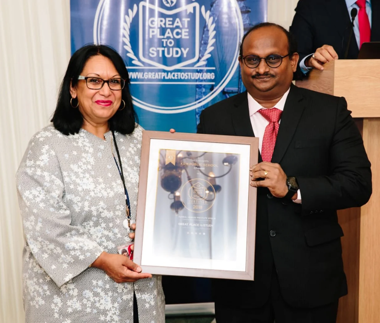 R.J. Bhuvanesh receiving the Great Place to Study award from Global League Institutes