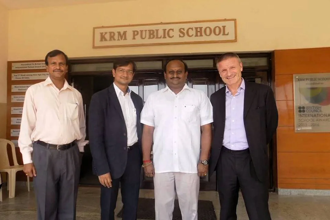 R.J. Bhuvanesh with visitors at the gate of KRM Public School